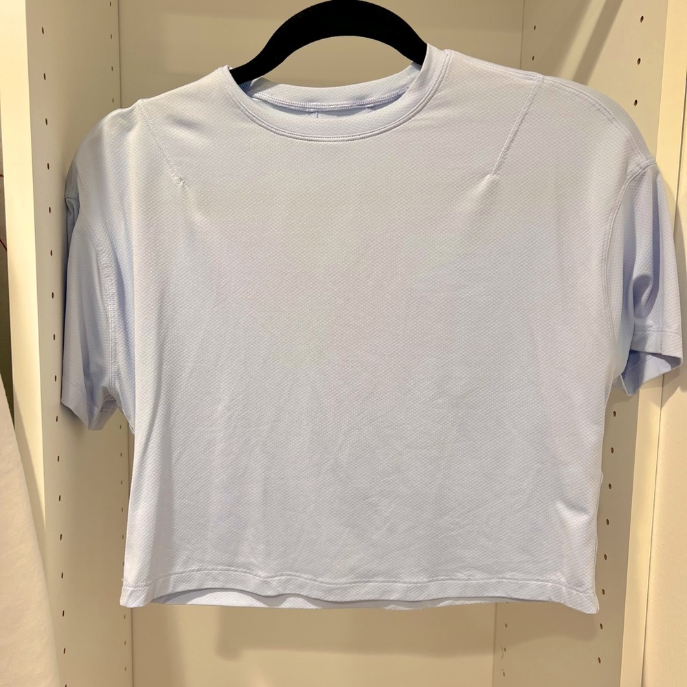 Lululemon Women's Light Blue Yoga Training Cropped T Shirt Top Size 0 XS
